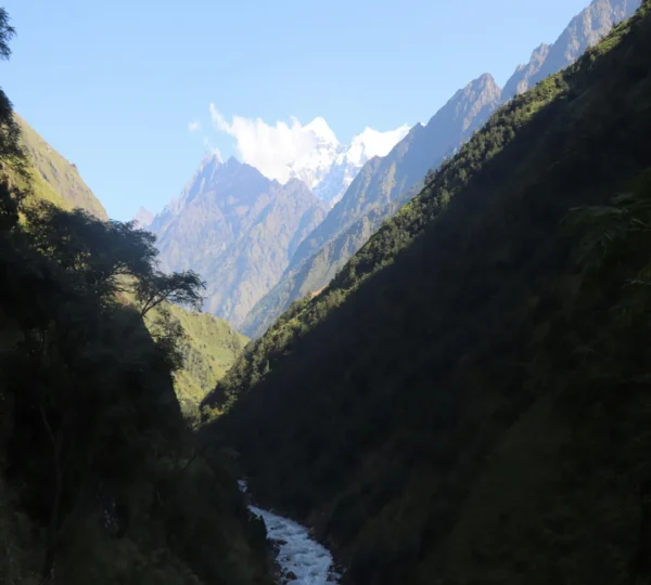 Scenic view of Manaslu Himal with river flowing between hills in Nepal
